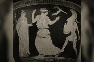 Helmeted Menelaus, shield on his arm, rushing at Helen as Aphrodite and Eros look on, Attic red-figure vase