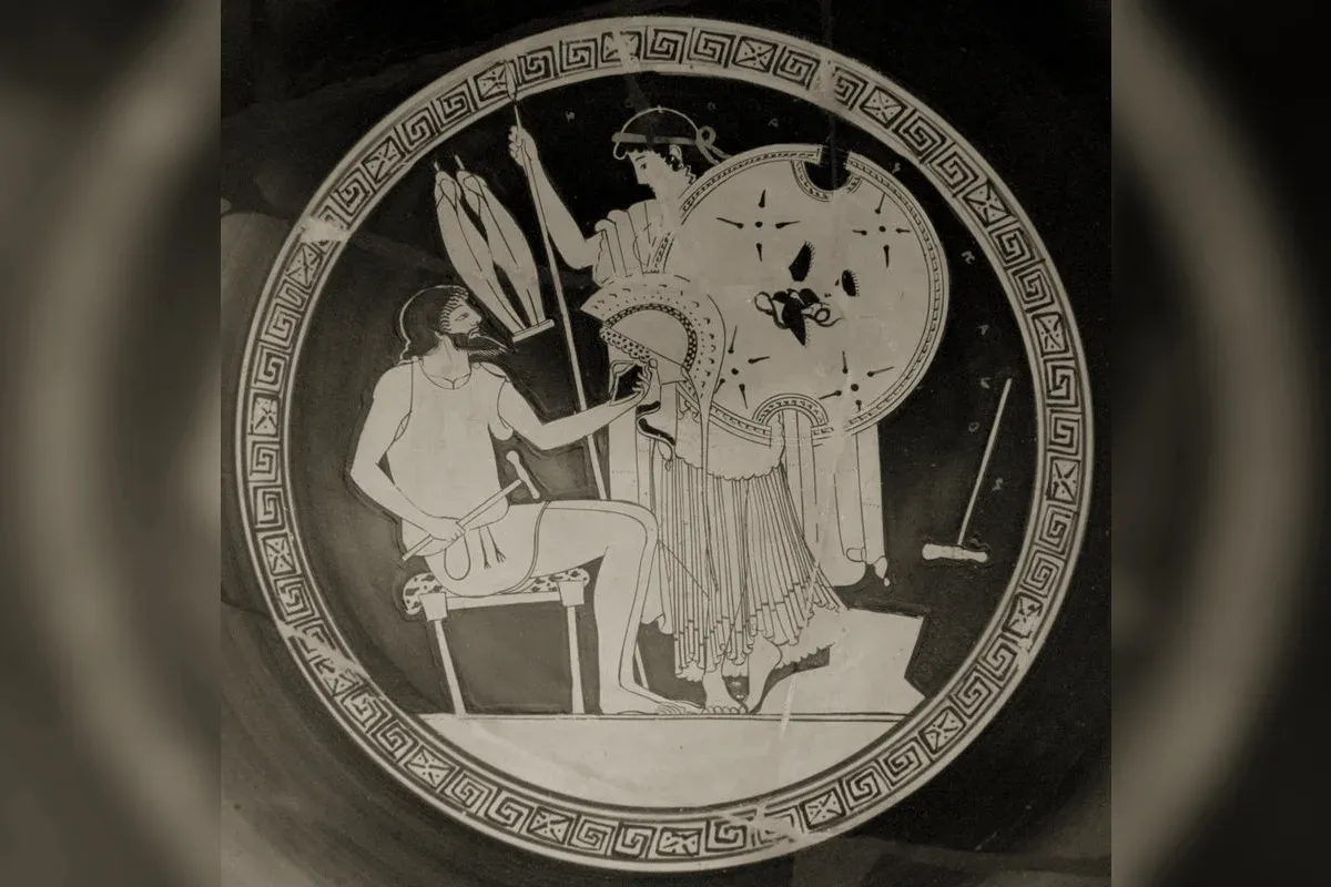 Hephaestus at his forge, striking a divine anvil, ancient Greek pottery