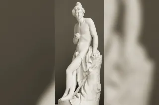 Paris in a Phrygian cap, bow in hand, before the walls of Troy