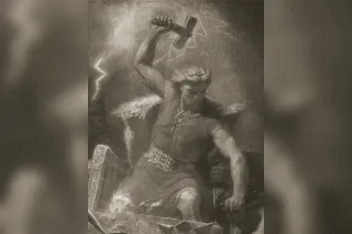 Thor's hammer Mjolnir, stout in shape with a short handle, surrounded by lightning
